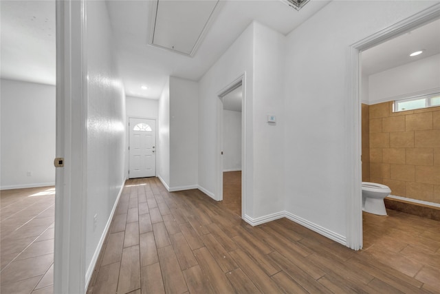 2522 Refugio Ave, Fort Worth, TX 76164 - corridor featuring attic access, wood finished floors, and recessed lighting