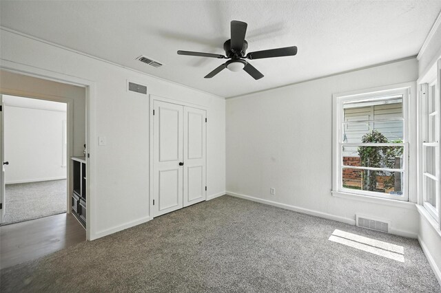 5416 Purington Ave, Fort Worth, TX 76112 - unfurnished bedroom featuring carpet floors, ceiling fan, and a closet