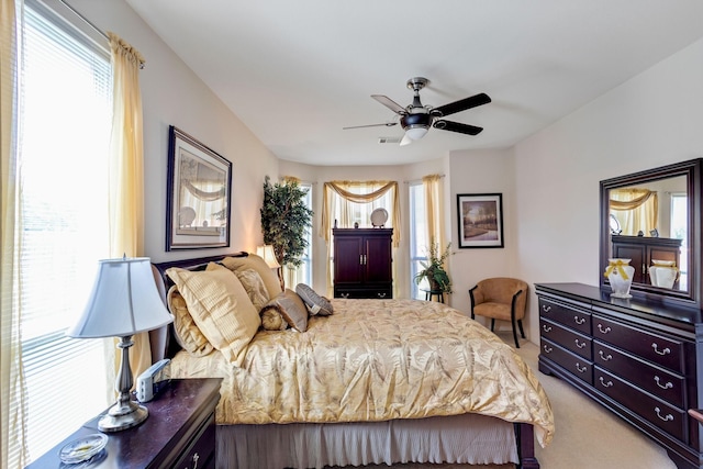 13317 Spinning Glen St, Fort Worth, TX 76040 - bedroom featuring multiple windows, light colored carpet, and ceiling fan
