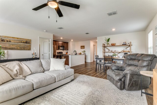 14304 Saddlebred Way, Fort Worth, TX 76052 - living room featuring dark wood-style floors, a ceiling fan, and recessed lighting