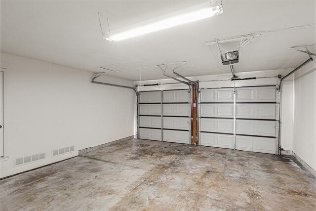 5207 Atlantis Ter, Arlington, TX 76016 - garage with a garage door opener