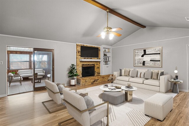 5207 Atlantis Ter, Arlington, TX 76016 - living area featuring a ceiling fan, light wood-type flooring, a fireplace, and built in shelves