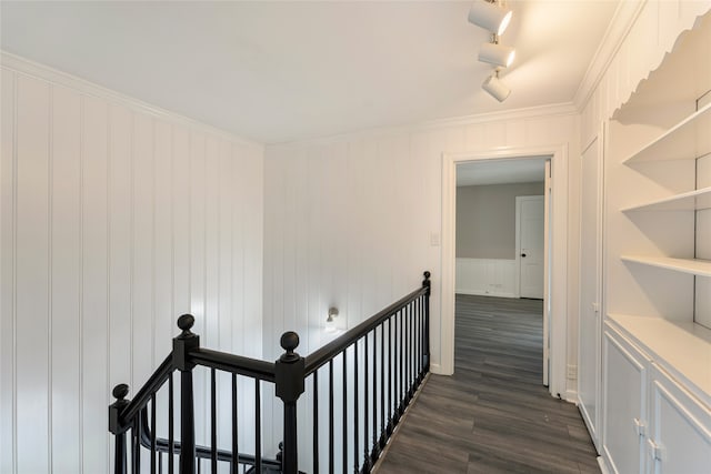 601 N 25th St, Corsicana, TX 75110 - hall with a decorative wall, an upstairs landing, dark wood-type flooring, and crown molding