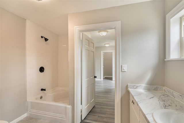 601 N 25th St, Corsicana, TX 75110 - full bathroom featuring bathing tub / shower combination, vanity, and wood finished floors