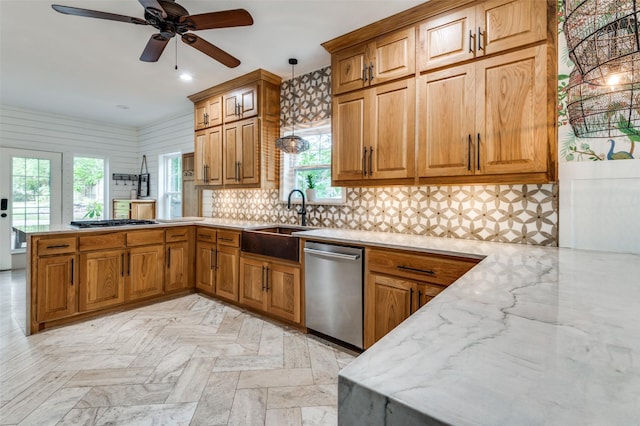 3700 Red Oak Dr, Corinth, TX 76208 - kitchen featuring appliances with stainless steel finishes, a peninsula, decorative backsplash, decorative light fixtures, and a ceiling fan
