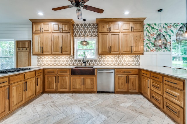 3700 Red Oak Dr, Corinth, TX 76208 - kitchen featuring dishwasher, gas cooktop, a peninsula, brown cabinetry, and pendant lighting