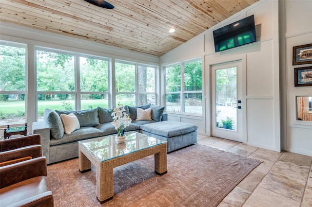 3700 Red Oak Dr, Corinth, TX 76208 - living room with plenty of natural light, lofted ceiling, a decorative wall, and wood ceiling