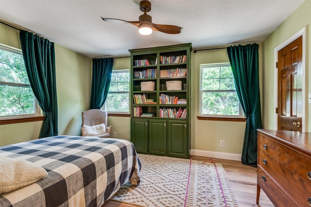 3700 Red Oak Dr, Corinth, TX 76208 - bedroom with light wood-style flooring and baseboards