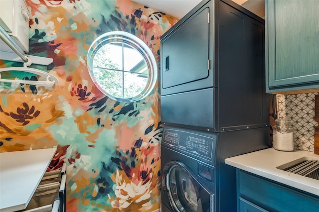 3700 Red Oak Dr, Corinth, TX 76208 - laundry area with stacked washing machine and dryer and cabinet space