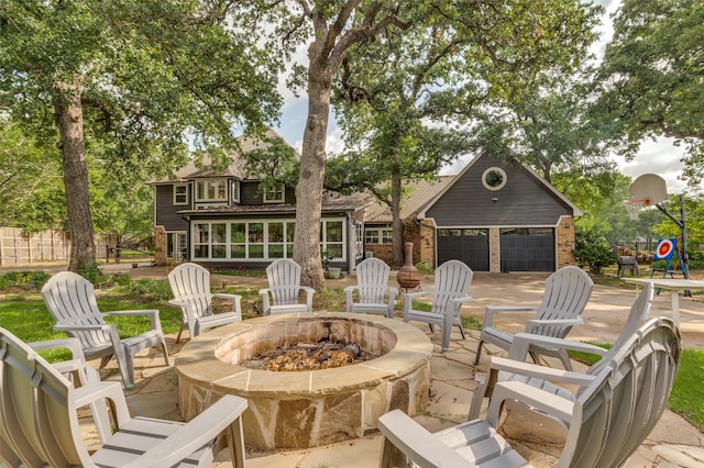 3700 Red Oak Dr, Corinth, TX 76208 - view of patio / terrace featuring a fire pit