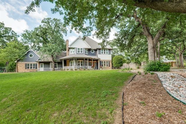 3700 Red Oak Dr, Corinth, TX 76208 - back of house with a chimney and brick siding