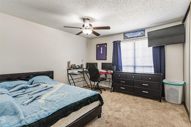 2500 E Park Blvd Unit T1, Plano, TX 75074 - bedroom with carpet flooring, a textured ceiling, a ceiling fan, and an office area