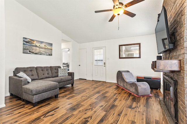 2500 E Park Blvd Unit T1, Plano, TX 75074 - living area featuring a ceiling fan, vaulted ceiling, dark wood-type flooring, and a large fireplace