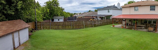 1032 Hampton Dr, Forney, TX 75126 - fenced backyard featuring a trampoline and a patio