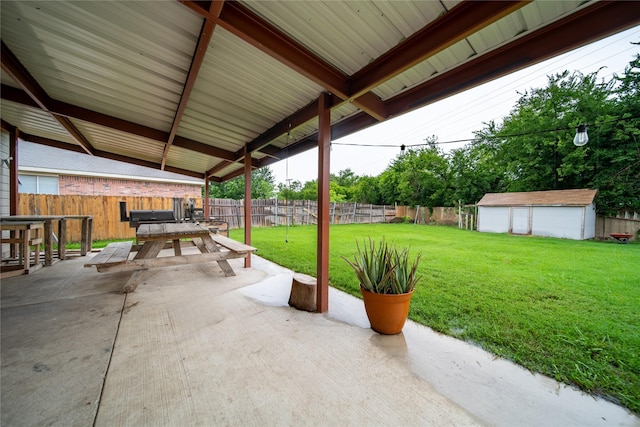 1032 Hampton Dr, Forney, TX 75126 - fenced backyard with a patio, outdoor dining space, and a shed