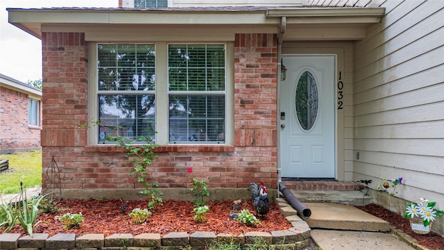 1032 Hampton Dr, Forney, TX 75126 - doorway to property with brick siding