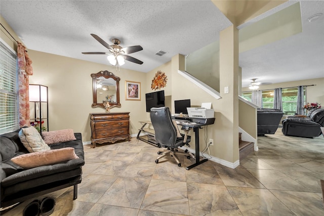 1032 Hampton Dr, Forney, TX 75126 - office space with ceiling fan and a textured ceiling
