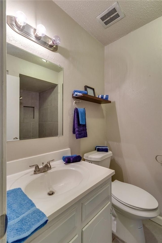 7820 Kermit Ave, Fort Worth, TX 76116 - bathroom with vanity and a textured ceiling