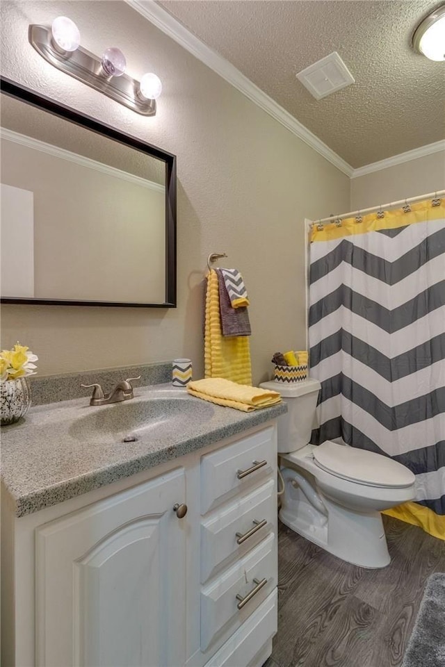 7820 Kermit Ave, Fort Worth, TX 76116 - bathroom featuring a textured ceiling, wood finished floors, vanity, ornamental molding, and curtained shower