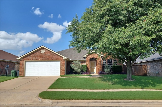 7215 Fossil Hill Dr, Arlington, TX 76002 - view of front facade featuring a garage, brick siding, and driveway