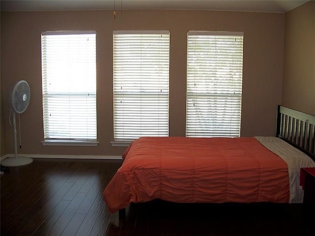 7215 Fossil Hill Dr, Arlington, TX 76002 - bedroom featuring baseboards and wood finished floors