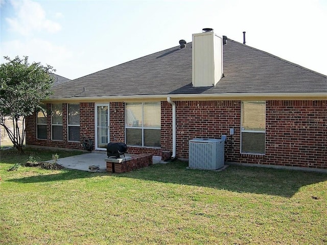 7215 Fossil Hill Dr, Arlington, TX 76002 - rear view of property with a patio area, brick siding, a yard, and a chimney