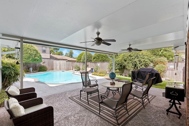 10707 Ferndale Rd, Dallas, TX 75238 - view of swimming pool featuring area for grilling, a fenced backyard, a patio, and ceiling fan