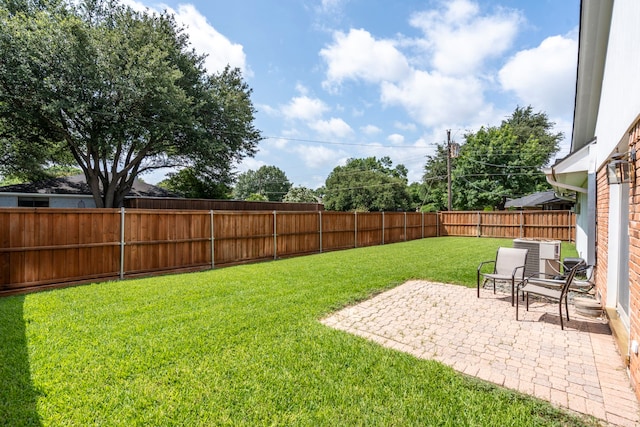 10707 Ferndale Rd, Dallas, TX 75238 - fenced backyard with a patio area