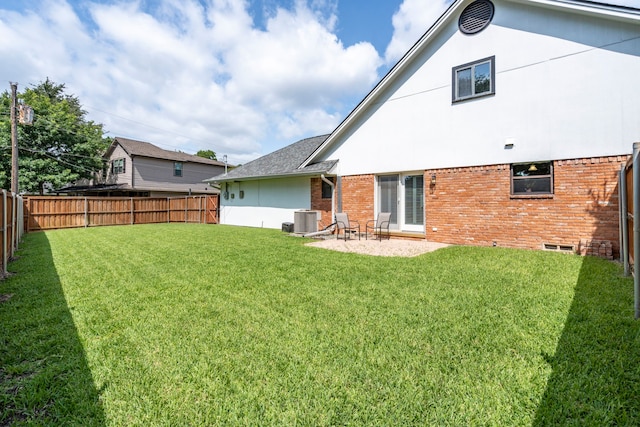 10707 Ferndale Rd, Dallas, TX 75238 - back of house featuring brick siding, a fenced backyard, a patio, and stucco siding