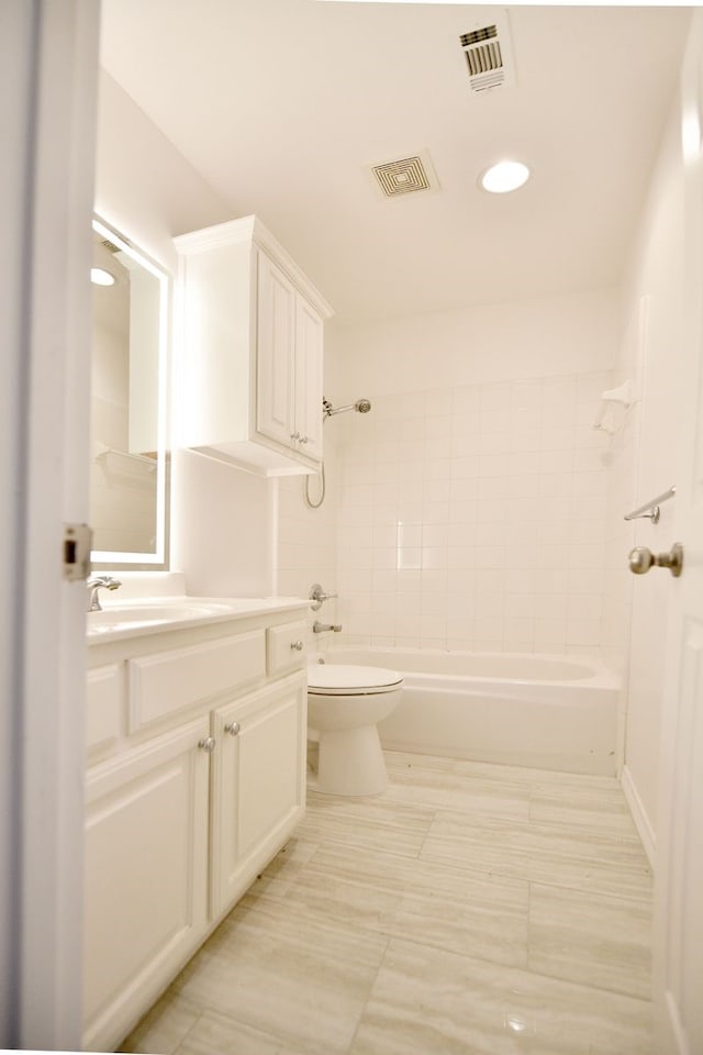 2505 Spring Hill Ln E, Garland, TX 75044 - bathroom featuring vanity, shower / tub combination, and recessed lighting