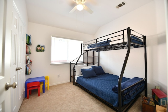 2505 Spring Hill Ln E, Garland, TX 75044 - carpeted bedroom with vaulted ceiling and a ceiling fan