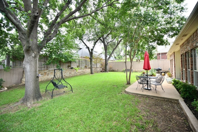 2505 Spring Hill Ln E, Garland, TX 75044 - fenced backyard with a patio