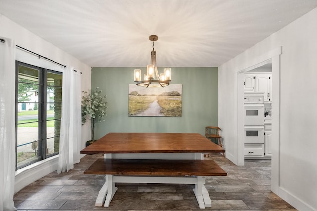 1322 Chestnut Rd, Mansfield, TX 76063 - dining space with a chandelier and wood finished floors