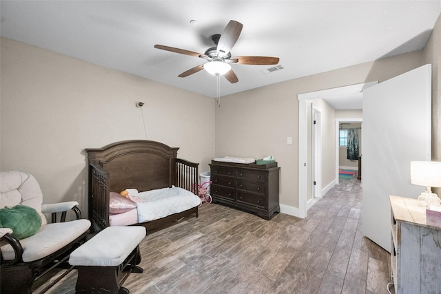 1322 Chestnut Rd, Mansfield, TX 76063 - bedroom with wood finished floors and a ceiling fan