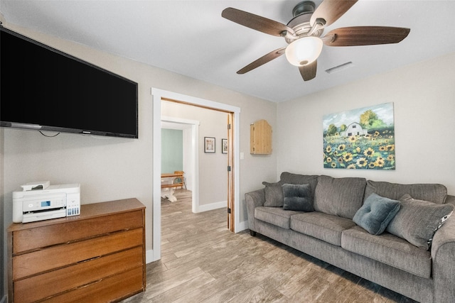 1322 Chestnut Rd, Mansfield, TX 76063 - living room with light wood finished floors and ceiling fan