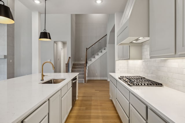 4505 N Summit View Dr, Mckinney, TX 75071 - kitchen with stainless steel appliances, custom range hood, light countertops, light wood finished floors, and recessed lighting