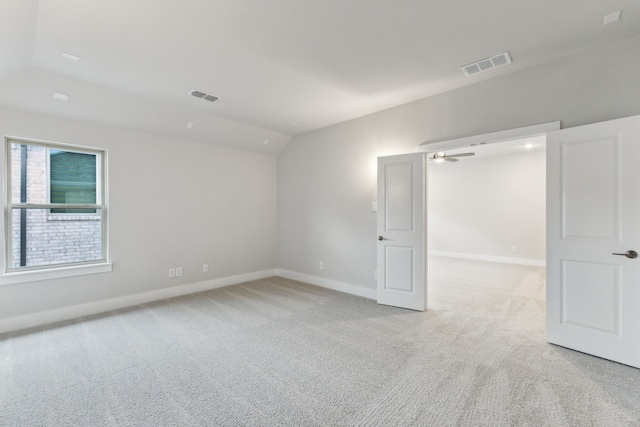 4505 N Summit View Dr, Mckinney, TX 75071 - empty room with light colored carpet, lofted ceiling, and ceiling fan