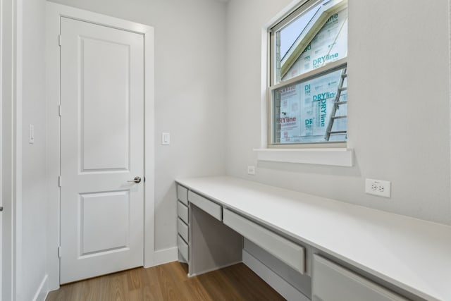 4505 N Summit View Dr, Mckinney, TX 75071 - unfurnished office with wood finished floors and built in desk