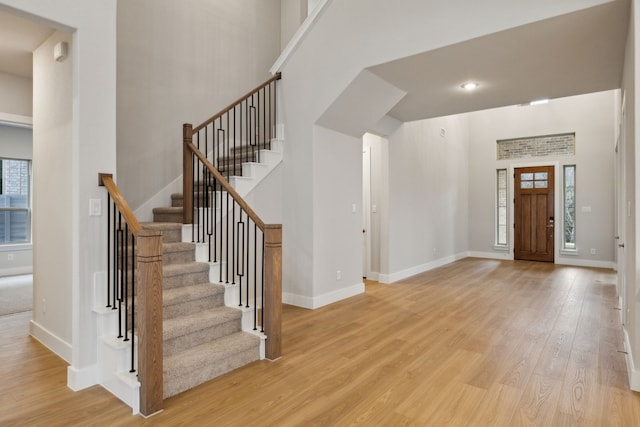 4505 N Summit View Dr, Mckinney, TX 75071 - entryway featuring wood finished floors, stairs, and a high ceiling