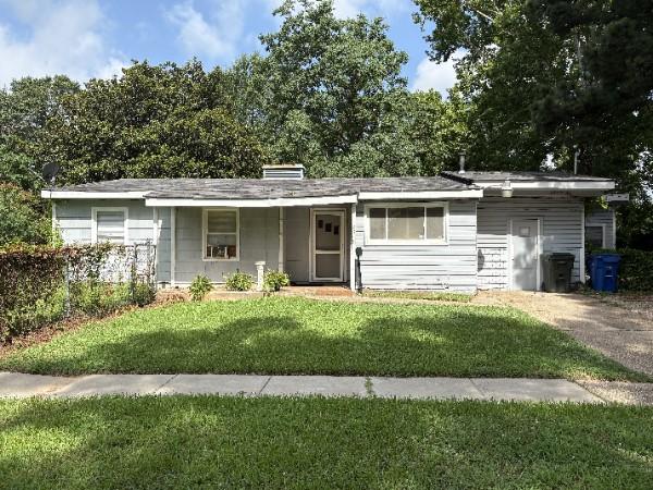 6546 W Canal Blvd, Shreveport, LA 71108 - ranch-style home featuring a front lawn