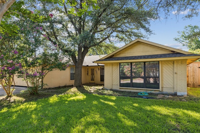5602 Overridge Dr, Arlington, TX 76017 - back of house with brick siding, an attached garage, and roof with shingles
