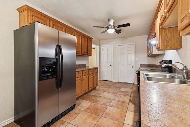 5602 Overridge Dr, Arlington, TX 76017 - kitchen featuring stainless steel refrigerator with ice dispenser, ceiling fan, light tile patterned floors, and brown cabinets