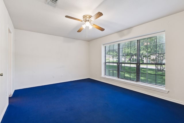 5602 Overridge Dr, Arlington, TX 76017 - unfurnished room featuring dark carpet and ceiling fan
