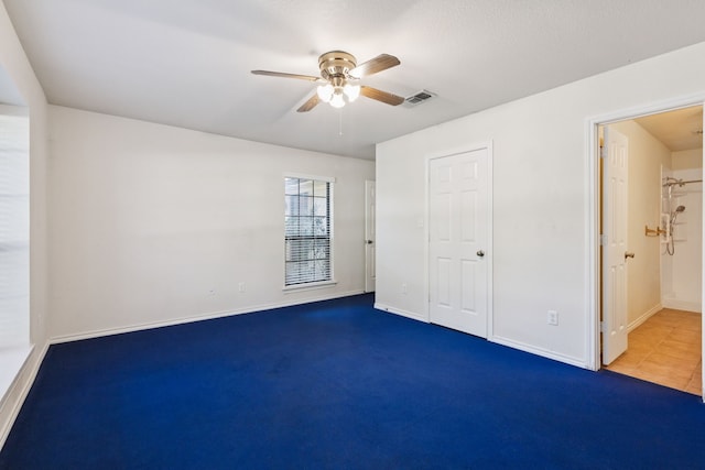 5602 Overridge Dr, Arlington, TX 76017 - unfurnished bedroom featuring ceiling fan and carpet floors