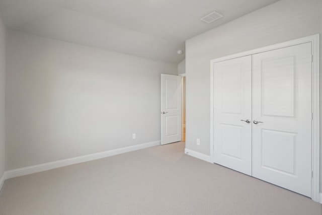 117 Whitlow Dr, Princeton, TX 75071 - unfurnished bedroom with light colored carpet, a closet, and lofted ceiling