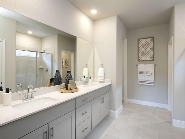 201 Whitlow Dr, Princeton, TX 75071 - full bathroom featuring double vanity, a shower stall, and recessed lighting