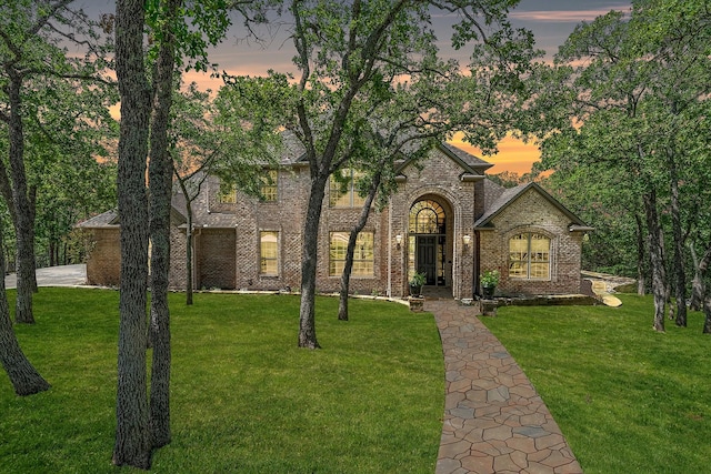 10111 Bluffview Cir, Pilot Point, TX 76258 - view of front of house with a front lawn and brick siding