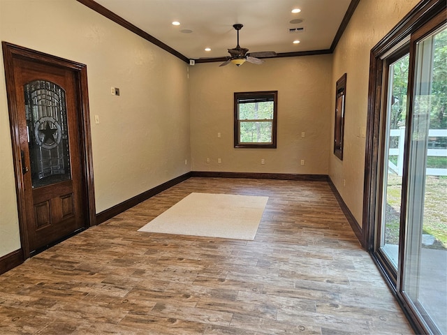 10111 Bluffview Cir, Pilot Point, TX 76258 - empty room featuring ornamental molding, ceiling fan, wood finished floors, a textured wall, and recessed lighting
