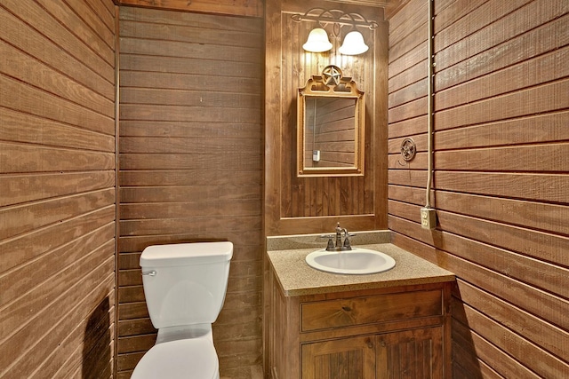 10111 Bluffview Cir, Pilot Point, TX 76258 - half bathroom with wood walls and vanity