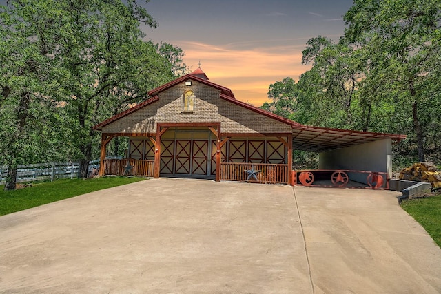 10111 Bluffview Cir, Pilot Point, TX 76258 - view of front of house featuring driveway and a carport
